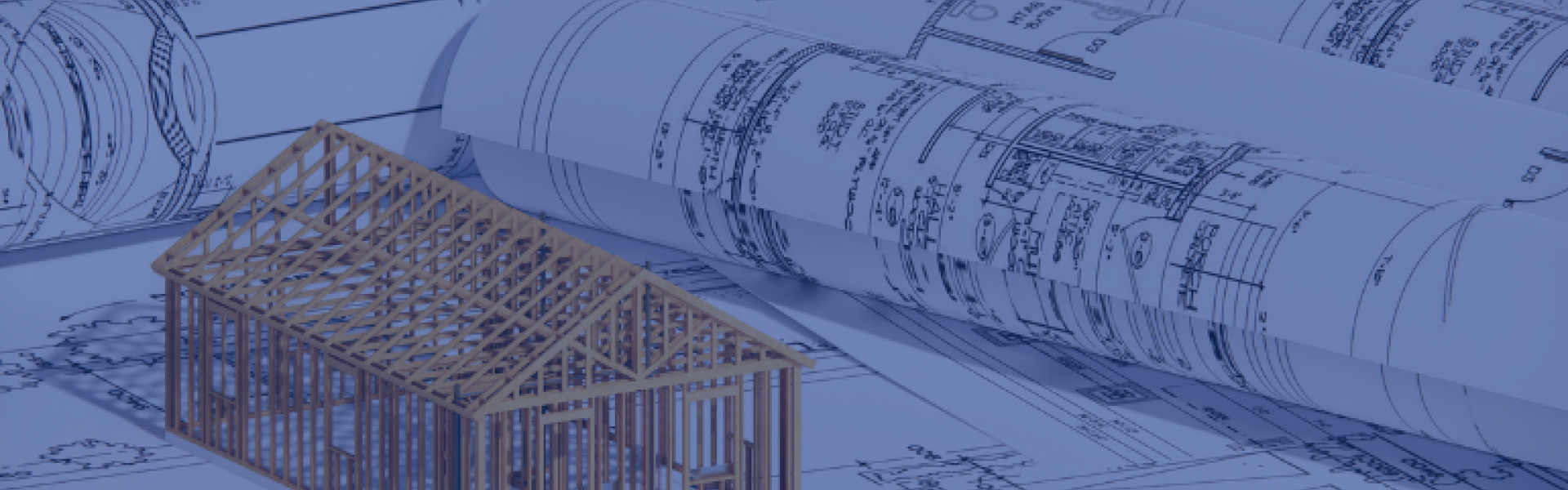 An architects drawing and a stick model of a large hall 