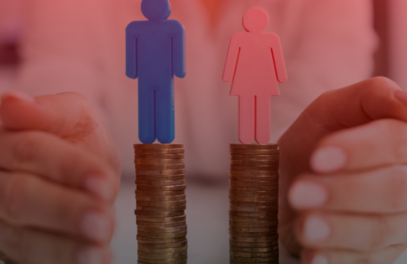 two stacks of coins with a blue man and a pink women atop