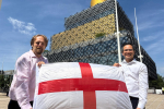 Cllrs Alden and Yip with a St George's cross flag