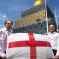 Cllrs Alden and Yip with a St George's cross flag